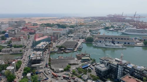 Aerial Panoramic View of Fort Urban Borough with Heavy Traffic on Roads and Large Cargo Terminal in
