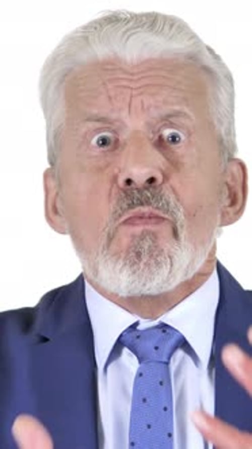 Angry Senior Man gesturing Pointing Finger, close up
