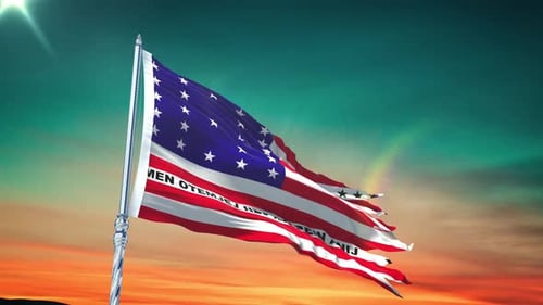 Distressed American Flag Waving Against Sunset