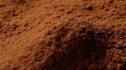 Cocoa Powder Texture on Wooden Background Spoon with Aromatic Coffee Cacao Chocolate Macro Close Up