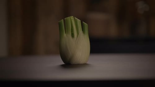 A Fresh Celery Heart Placed Beautifully on a Wooden Table Ready for a Delicious Meal