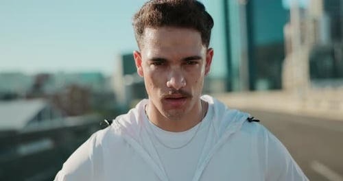 Sweaty Man Looks at Camera After Working Out