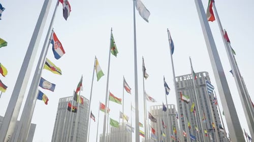 Many National Flags Waving in an Urban Setting