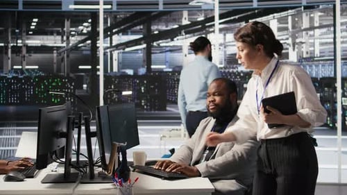 Lead Data Center Technician Overseeing Team Integrating AI Automation in Rigs