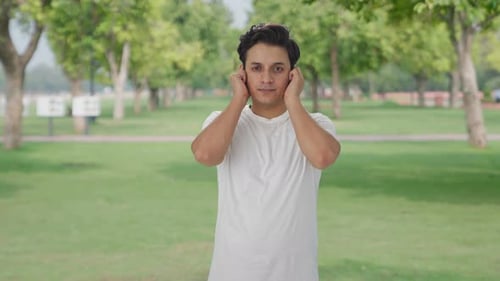 Guilty Indian man saying sorry and apologizing