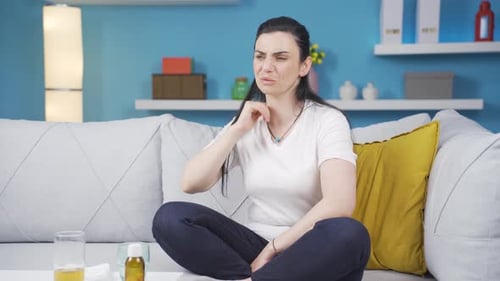 Sick woman suffering from neck pain.