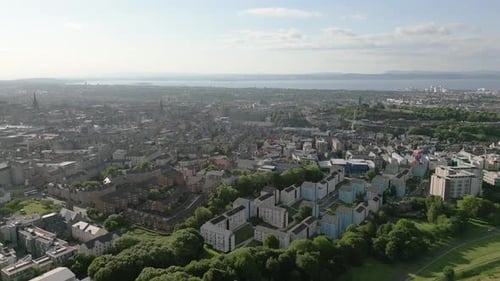 Aerial orbit around Edinburgh city centre cityscape on natural environment, Edinburgh, Scotland, UK
