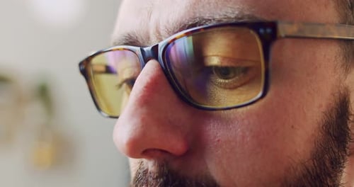 Adult in Glasses Looking at Screen Close Up