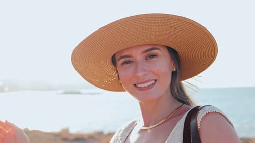 Beautiful Woman Smiling on Sunny Beach Vacation