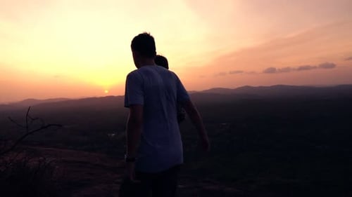 Silhouette Of Couple Admire Sunset And Landscape Standing On Hill, Super Slow Motion 240fps