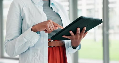 Woman, tablet and hands typing for research, communication or business networking at the office