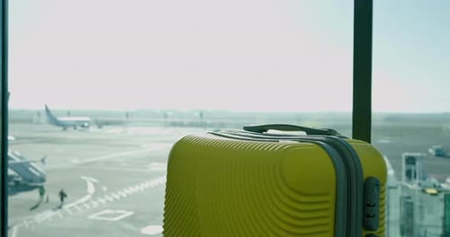 Airport, luggage and suitcase in waiting area or lounge for passenger for departure