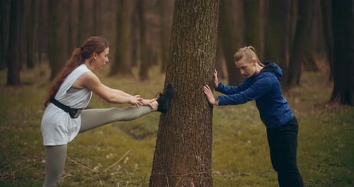 Two Woman Workout Exercising In Park Jogging Fitness