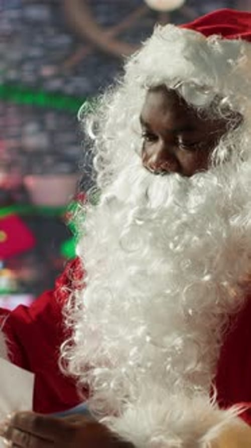 Santa Claus Reading Christmas Letter Close Up