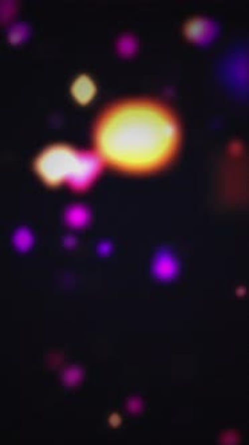 Abstract Colorful Sparkling Bokeh Light Particles Background
