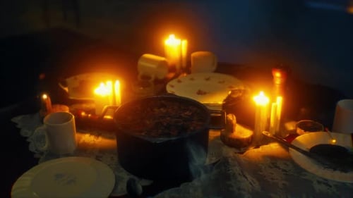 Warm Candlelight Table Setting with Flickering Flames