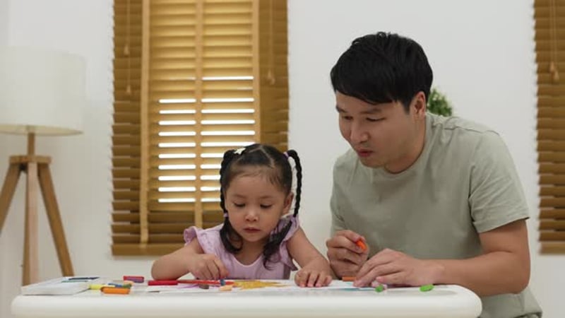 Young Girl Drawing with Crayons at Table Indoors, Kids Stock Footage ft ...