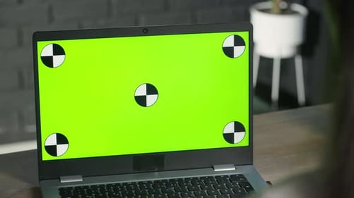 Girl Freelancer Uses Laptop with Green Screen for Work Remote Job Concept Partial View of Woman