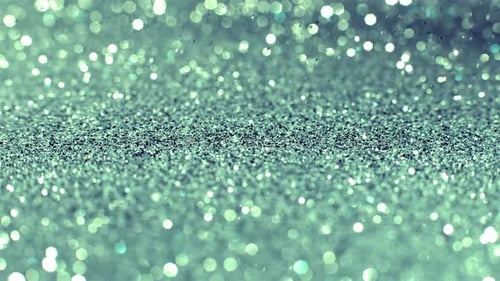 Shimmering Cyan Blue Glitter Particles Abstract Background