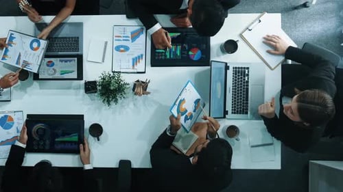 Top view of business people discussing about financial strategy. Directorate.