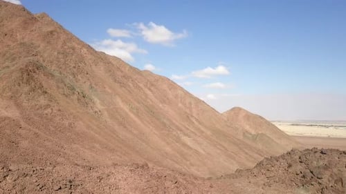 Desert landscape - Aerial footage of mountains and dry land.