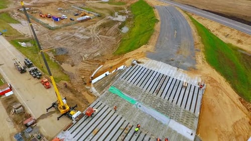 New Bridge Construction Over Suburban Road. View From Above Bridge Repair Over