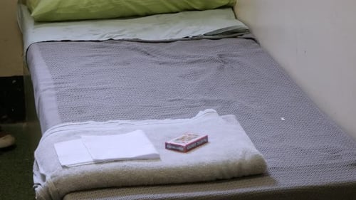 Inside A British Prison Cell. Home Environment For A British Prisoner.
Bed And Cover To Keep Warm..