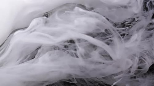 White Ink Swirls in Water Abstract Background