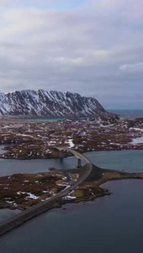 Fredvang Bridge and Village Lofoten Islands Landscape of Norway Aerial View Vertical Video