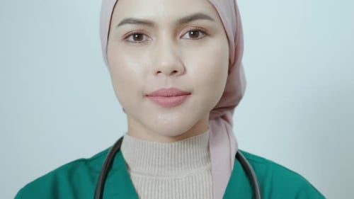 Portrait of Female muslim doctor with stethoscope at office.