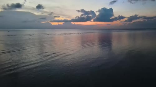Panorama Of Sunset With Calm Ocean In Island Of Bali In Indonesia. - aerial