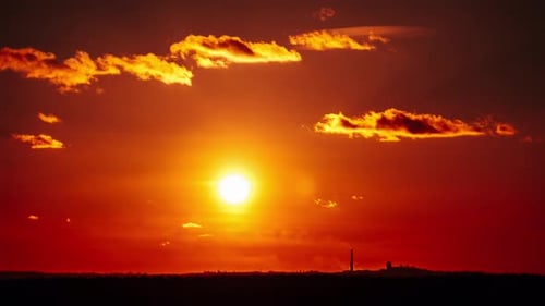 Golden Sunrise over Urban Landscape at Dawn