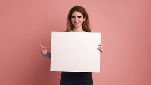 Young Woman Holding Blank Sign and Smiling