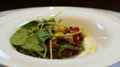 Prepared Beef Salad with Sauteed Vegetables and Greens