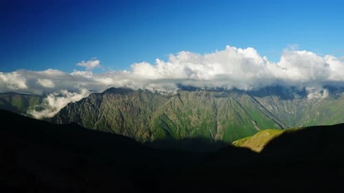 Timelapse of Changing Clouds Over Caucasus Mountain Ridge in Daylight Majestic Peaks and Valleys