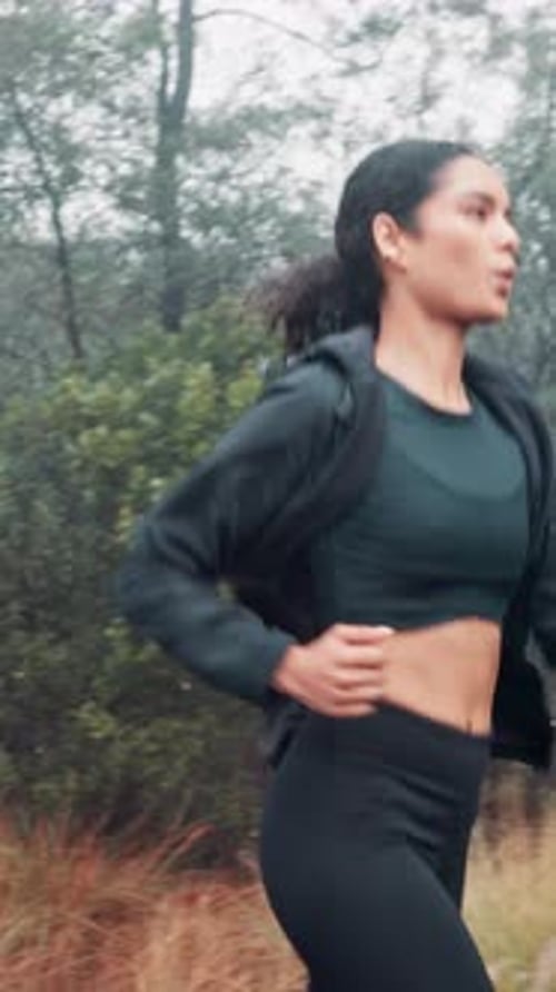 Forest, running or woman with fitness, exercise or sports with workout, practice or routine