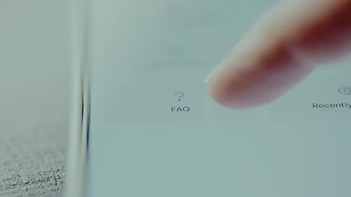 Finger Taps FAQ App on Tablet Device