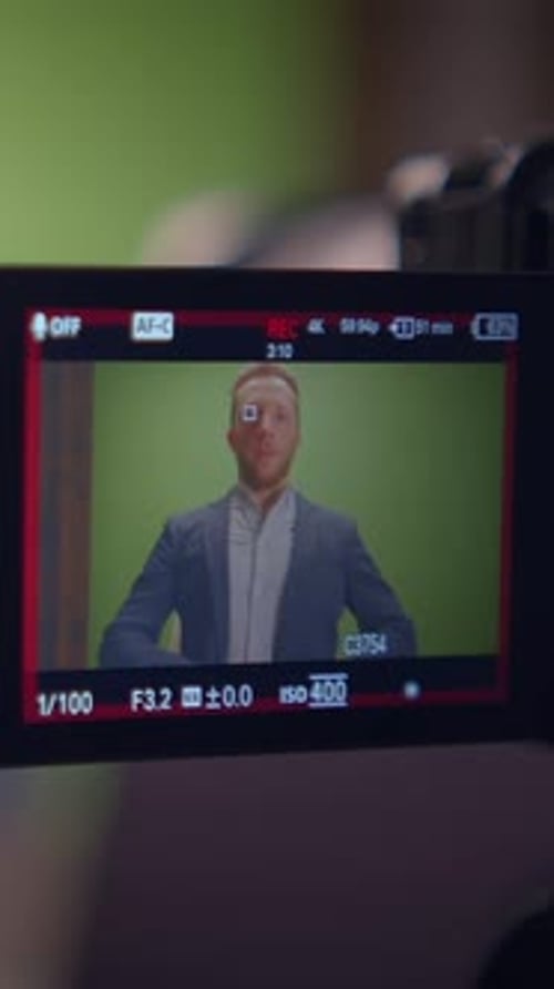 A Professional Video Shoot Featuring a Subject Positioned on Camera and Performing Various Actions