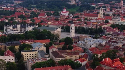 Aerial Views Showcase Vilnius' Old Town Featuring Red Rooftops the Cathedral and Lush Green Squares