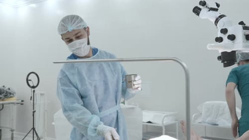 Portrait of a surgeon preparing for the procedure at work in a hospital