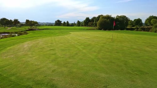 Scenic Aerial View of Lush Green Golf Course