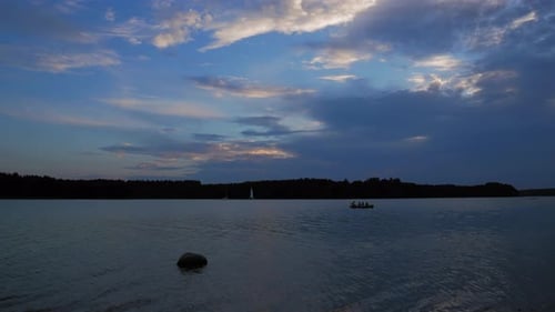 Dramatic Sunset Sky Over The Calm Lake At Landscape Park In Wdzydze In Northern Poland - timelapse