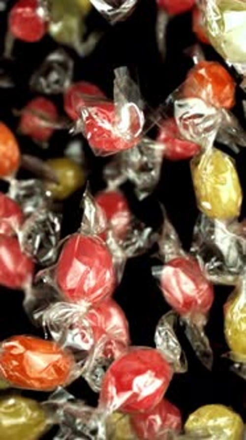 Super Slow Motion Multicolored Lollipops Filmed on a Highspeed Camera at 1000 Fps