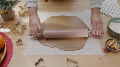 Rolling Cookie Dough for Christmas Baking at Home
