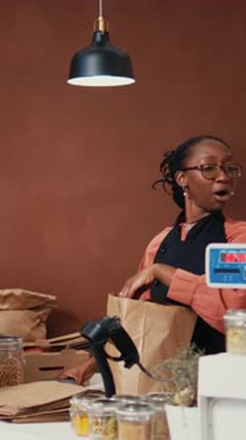 Vertical Video African American Buyer Paying with Card at Pos in Eco Store