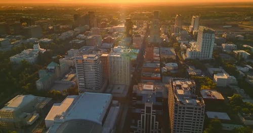 Beautiful architecture of modern American city in the rays of setting sun. Sacramento panorama