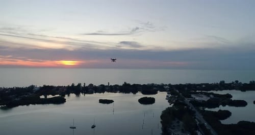 Aerial Shot of Flying Towards Drone in the Sky at Sunset