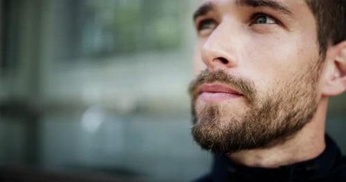 Smiling Man Looking at Camera in Close Up