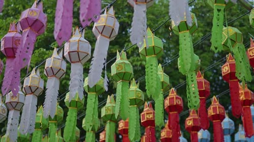 Hanging one hundred of multi colours lantern light lamp for Loy Krathong Festival in Lampune.