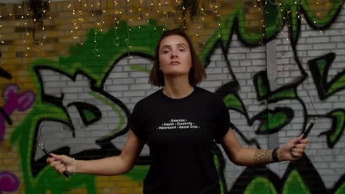 Woman trains and jumps rope, coordination training, crossfit training day in the gym, strength fit b